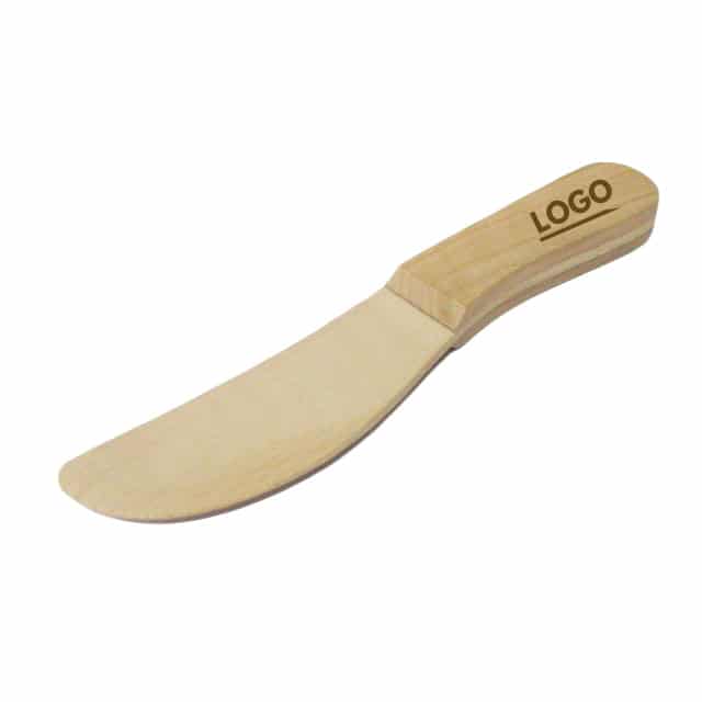 Wooden kitchen buttering knife with engraved handle
